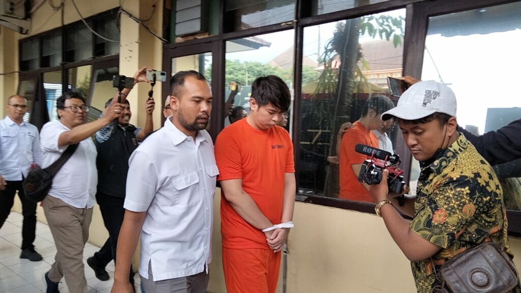 Tersangka digiring anggota Satreskrim Polresta Malang Kota