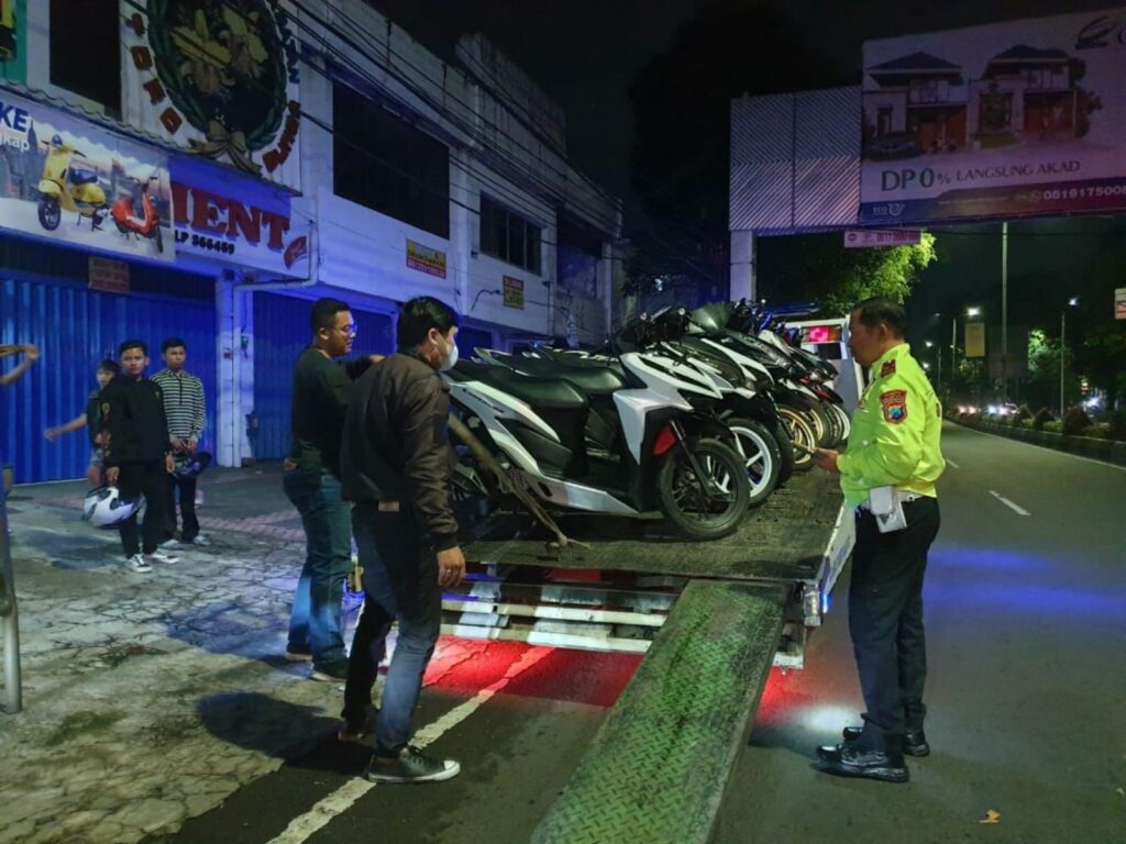 Puluhan motor yang diamankan di Mapolresta Malang Kota terkait balap liar. (istimewa)