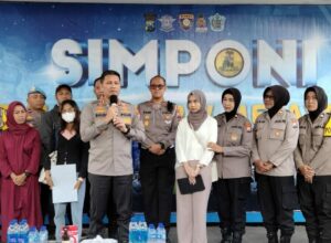 Kapolresta Malang Kota, Kombes Pol Budi Hermanto (memegang mik) saat meresmikan layanan SIMPONI di Satpas SIM Polresta Malang Kota, Rabu (09/08/2023).