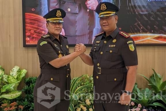 SALAM KOMANDO: Rudy Hartawan Manurung dan Edy Winarko (ist)