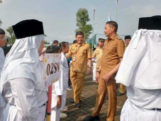 Pj Wali Kota Malang, Wahyu Hidayat secara simbolis membuka kompetisi olahraga, seni dan busana muslim antar SD se-Kota Malang. (istimewa)