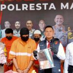 Kasat Reskrim Polresta Malang Kota, Kompol I Gusti Agung Ananta menggelar konferensi pers hasil ungkap penipuan modus gandakan uang, Senin (23/09/2024)