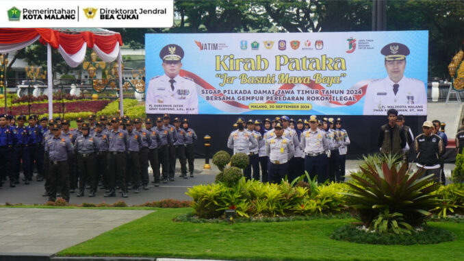 Kirab Pataka Jer Basuki Mawa Beya Bawa Tiba di Kota Malang, Bawa Pesan Damai Pilkada dan Gempur Rokok Ilegal, Senin 30 September 2024. (Sumber Prokompim)