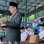 Paslon Wali Kota Batu Nomor Urut 1, Nurochman dan Heli Suyanto hadiri Peringatan Hari Santri Nasional 2024 digelar oleh PCNU Kota Batu di Stadion Brantas Kota Batu (Ist)