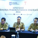 Presentasi Apresiasi Kinerja Pemda 2024, Pj. Walikota Malang Paparkan Upaya Tingkatkan Daya Saing Daerah. (Sumber Prokompim)