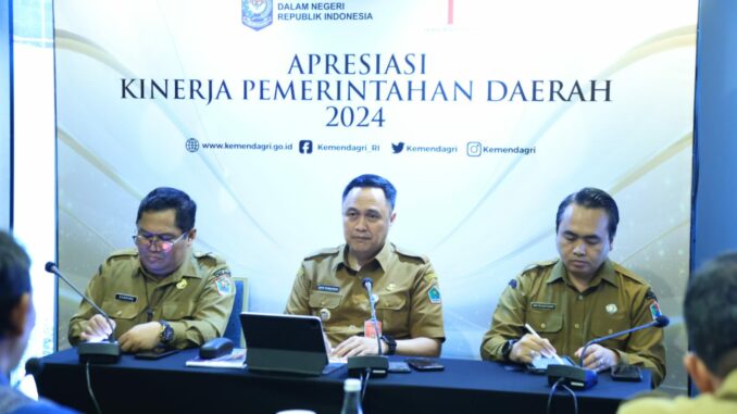 Presentasi Apresiasi Kinerja Pemda 2024, Pj. Walikota Malang Paparkan Upaya Tingkatkan Daya Saing Daerah. (Sumber Prokompim)