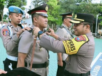 Foto : Kapolres Batu saat pimpin Sertijab Kapolsek Pujon di Lapangan Apel Mapolres Batu.(Ist)