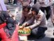 Aksi simpatik jajaran Polresta Malang Kota ditengah pengamanan Mayday 2025