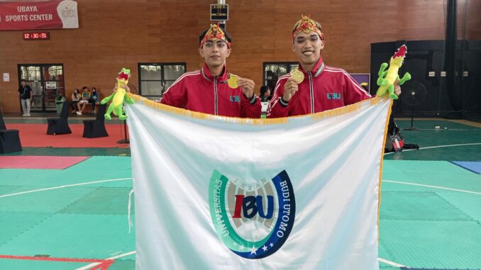 WhatsApp Image 2025-06-01 at 15.18.13 Rahman Maulana dan Ahmad Ramadhani, atlet Pencak Silat UIBU di Kategori Ganda Putra peraih medali emas Pomprov Jatim, Minggu (01/06/2025).