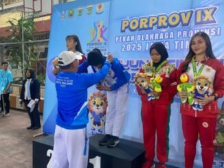 Emas pertama cabang olahraga Kickboxing Kota Malang di Porprov IX Jatim disumbangkan oleh Karina Arisandi Putri. (ist).