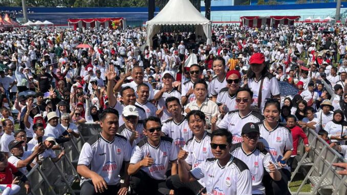 Puluhan ribu peserta memadati Stadion Gajayana dalam acara Gajayana Jalan Sehat yang diprakarsai Partai Solidaritas Indonesia (PSI) pada Sabtu, 23 Agustus 2025.
