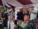 Camat Lowokwaru, Rudi Cahyono Catur Utomo (tiga dari kanan) disaat memberangkatkan peserta pawai budaya Nusantara Kelurahan Mojolangu, Minggu (31/8/2025).