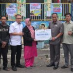 Penyerahan santunan BPJS Ketenagakerjaan kepada istri Almarhum, semoga manfaat dan berkah. (istimewa).