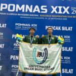 Rachman Maulana dan Ahmad Ramadhani, dua atlet UIBU peraih medali perak pada nomor Jurus Ganda Putra dalam ajang POMNAS XIX 2025.