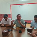 Djoni Sudjatmoko, inisiator aksi menyampaikan dukungan terhadap program MBG dalam konferensi pers, Jumat (19/6/2026).