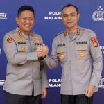 SALAM KOMANDO: Kapolresta Malang Kombes Pol. Danang Setiyo Pambudi bersama Kombes Pol Putu Kholis Aryana. (ist).