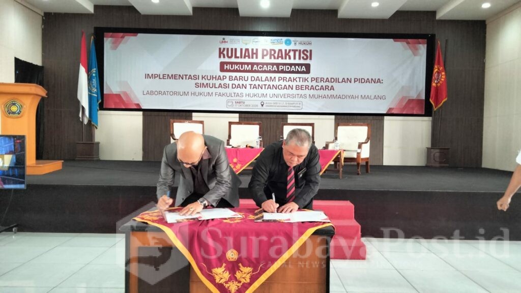 Penandatanganan MoU antara Dekan FH UMM, Prof Dr Tongat, SH, M.Hum dan Kantor Advokat Surjo & Partners.